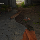 A first-person view of a soldier in a bunker looking at an ammo box in Far Cry 6.